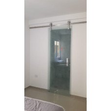 PORTA DE VIDRO DE CORRER COM ROLDANAS APARENTE
